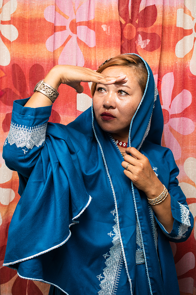 Portrait of Roghaia Mohammadi in blue and silver hijab
