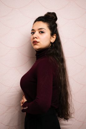 Portrait of refugee Joud in side profile