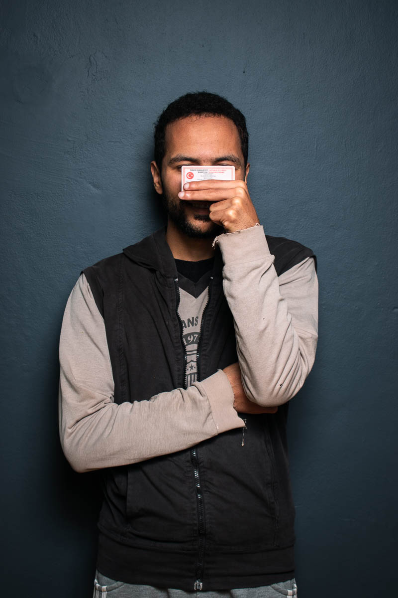 Portrait of Ubeyd, not showing his face and is wearing a black blazer jacket.
