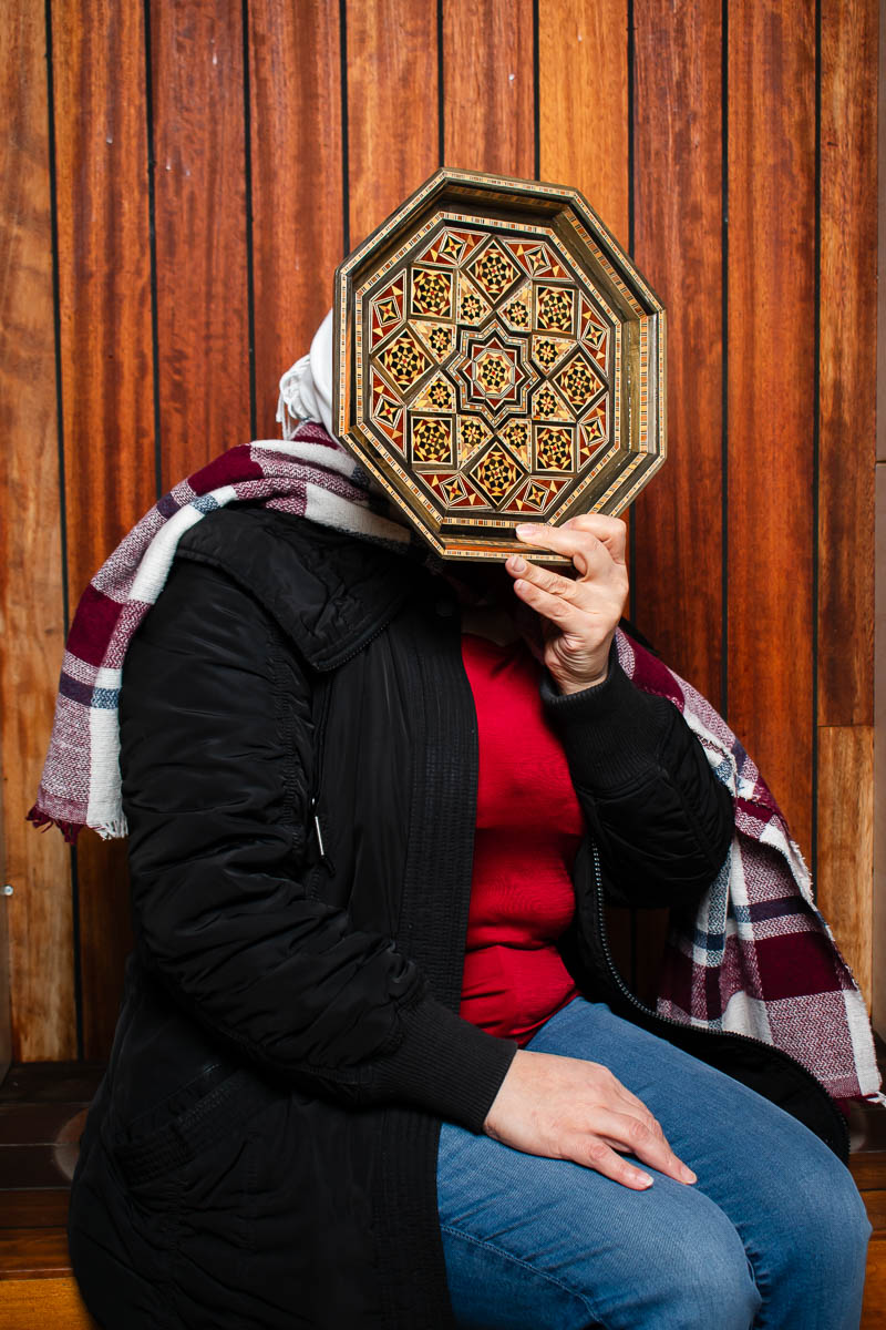 Portrait of Hadia, covered her face in the camera.